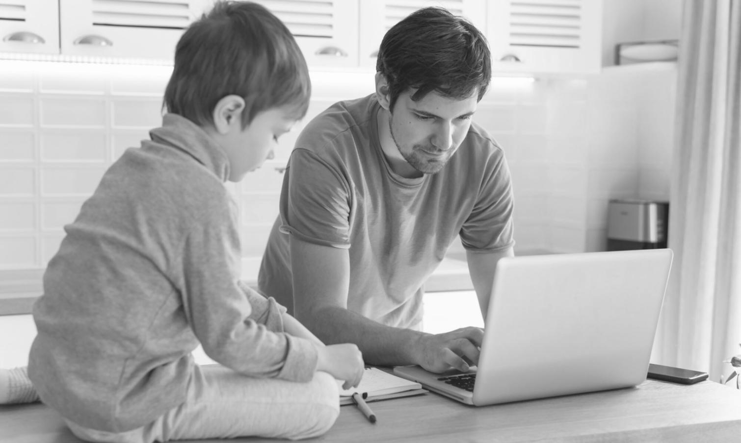 Person reviewing financial documents with focused attention